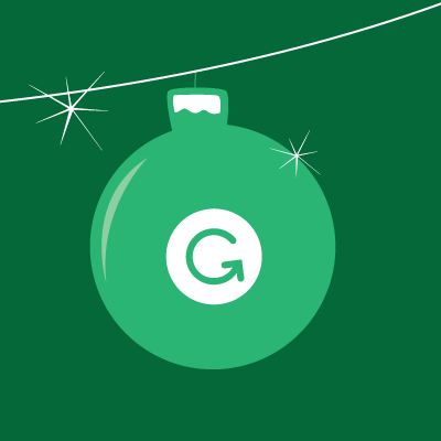 A Christmas ornament with the Grammarly icon on it