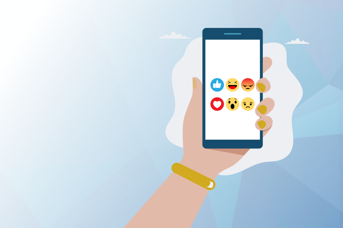 Image on standard seoplus+ blue triangle background, with illustration of a hand holding a mobile phone. The 6 Facebook reactions (like, love, angry, surprised, laughing, sad) are all featured on a white background on the phone screen.