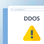 Graphic of the corner of a computer monitor on the standard seoplus+ blue triangle background that has a yellow warning triangle with DDOS overtop.