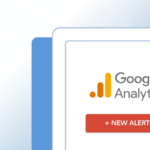 Close up of a computer monitor with the Google Analytics logo on the screen and a new alert button underneath