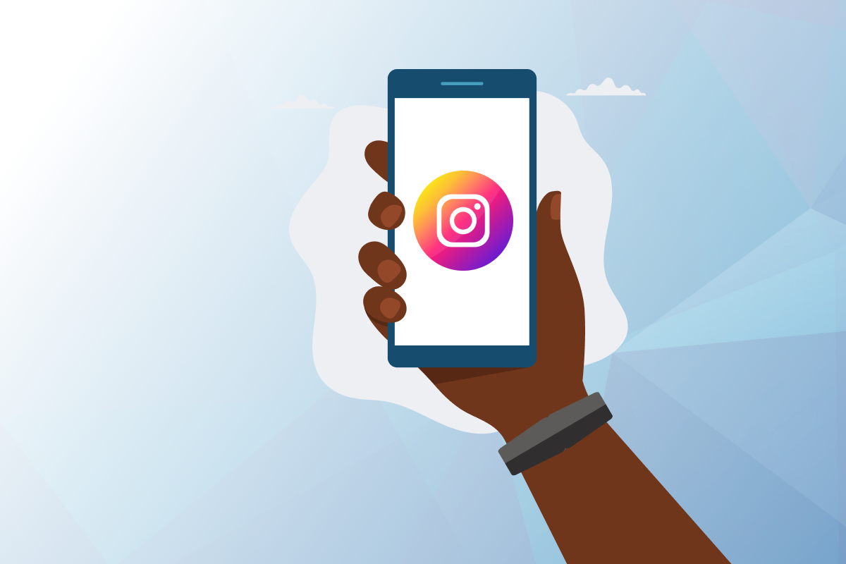Image on standard seoplus+ blue triangle background, with illustration of a hand holding a mobile phone with the Instagram logo in the centre.