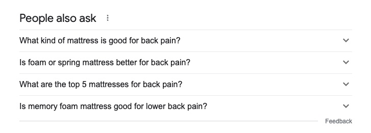 Google's "People Also Asked" questions section near the top third of the page.