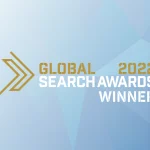 Graphic of Global Search Awards 2022 winner logo on standard seoplus+ background